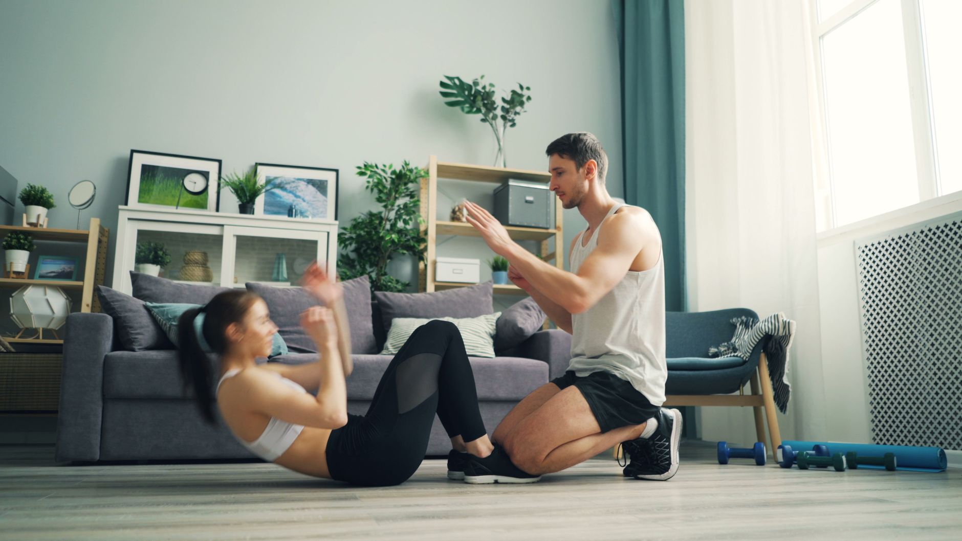 Abdominales en pareja